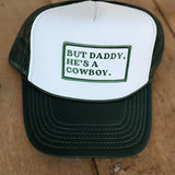 He’s a Cowboy Trucker Hat